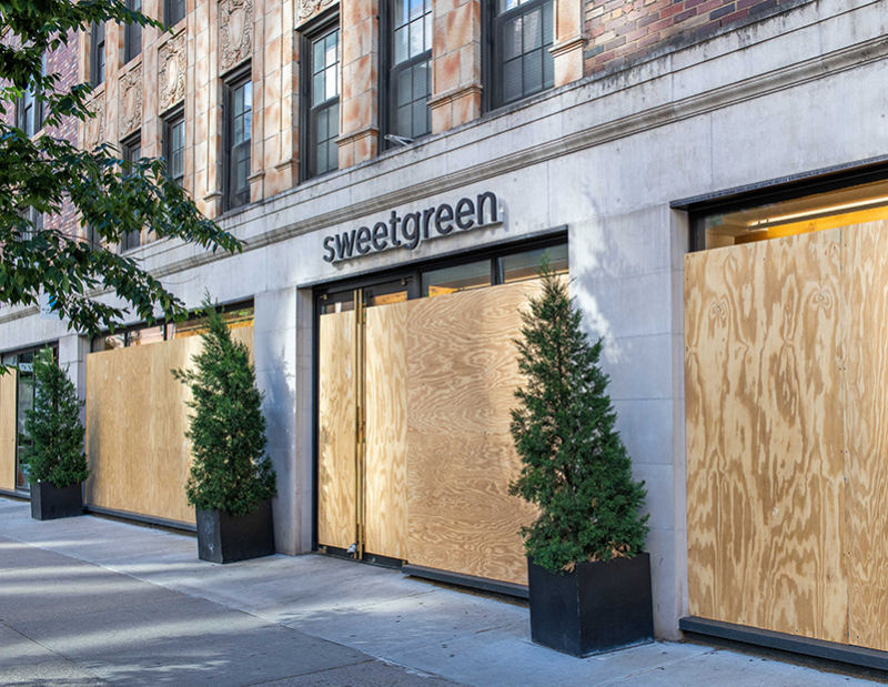 Boarded up windows to protect the business from a hurricane